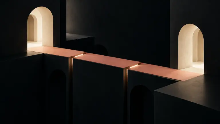Two warm ivory architectural openings connected by a muted coral bridge through a dark dimensional corridor.